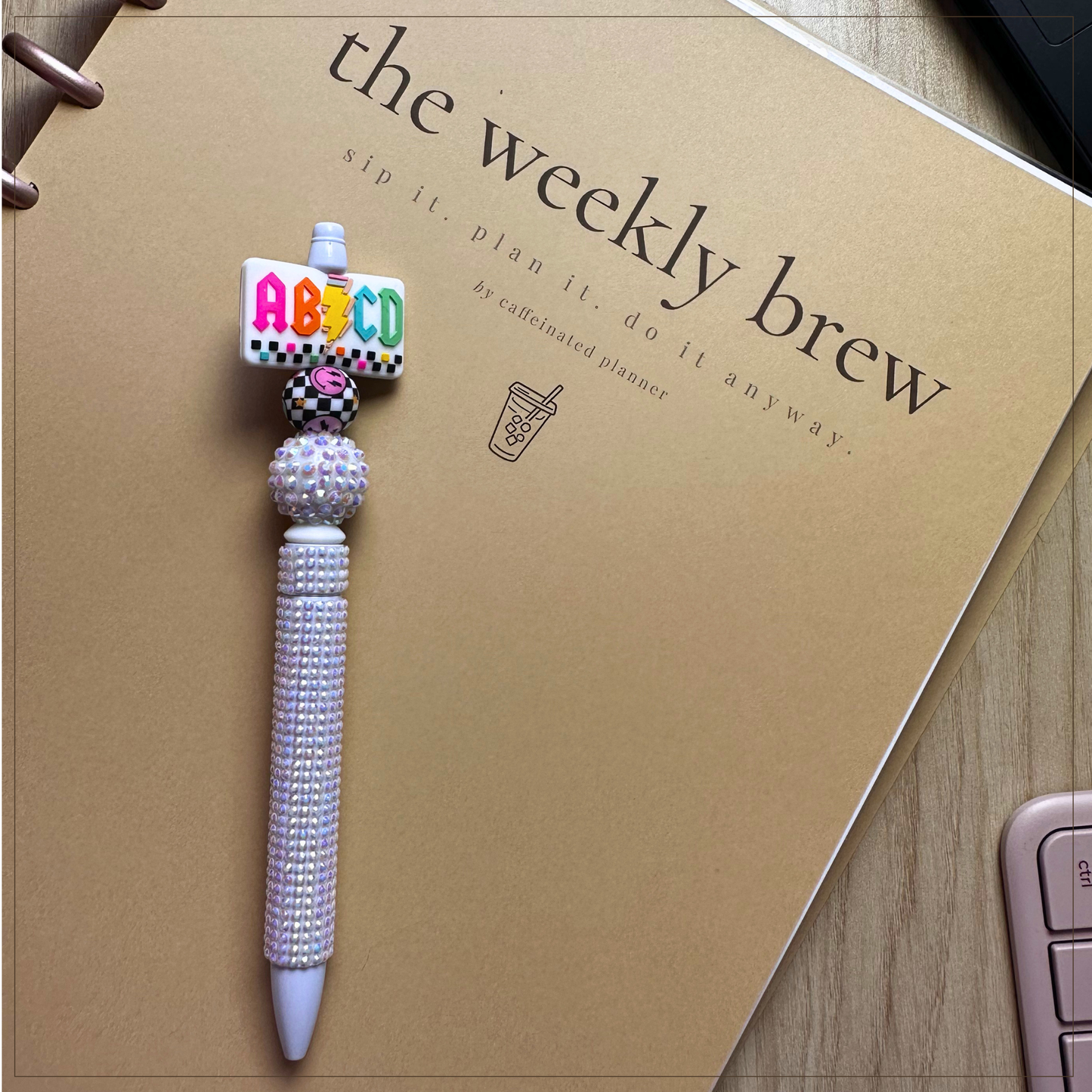 ABCD checkered smiley | bling pen