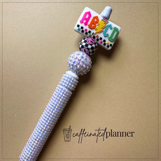 ABCD checkered smiley | bling pen